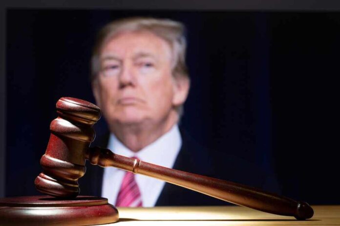 shutterstock_2284014577.jpg featured image Gavel in foreground with blurry man in background.