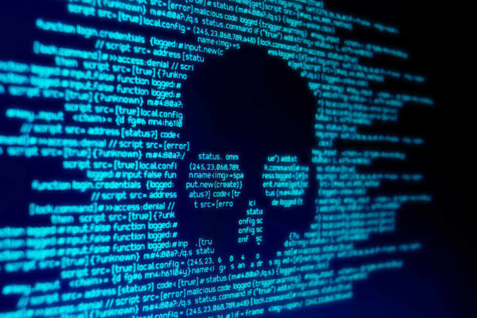 shutterstock_1050436496.jpg featured image Skull silhouette in blue computer code background.
