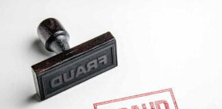 Fraud stamp and red stamped imprint on paper