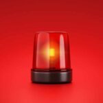 Red emergency light on red background