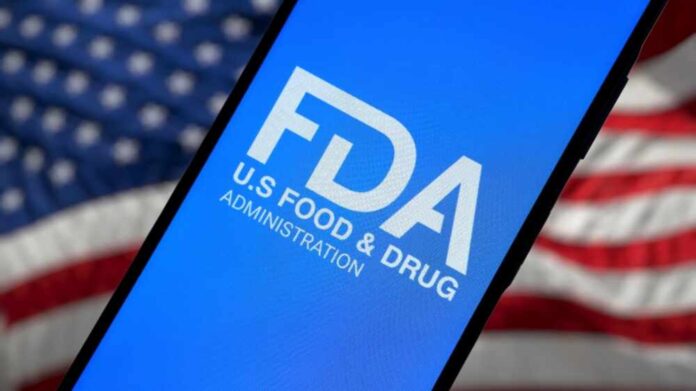 shutterstock_2593746281.jpg featured image FDA logo on smartphone American flag background