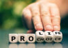 Hand shifting blocks spelling pro life to pro choice