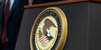 Department of Justice seal on a podium