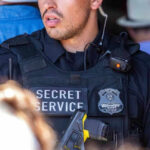 Secret Service officer in uniform with equipment visible