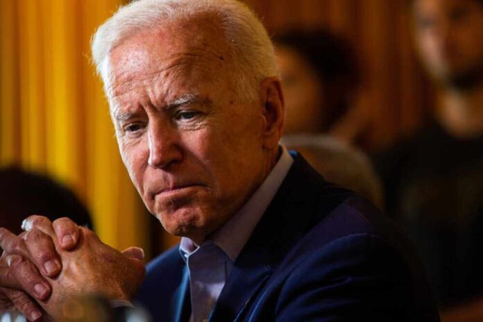 Joe Biden solemn, thinking.