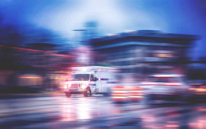 Ambulance speeding through city street
