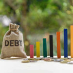 $37 Trillion Shock — America’s Time Bomb Debt sack with rising financial graph bars