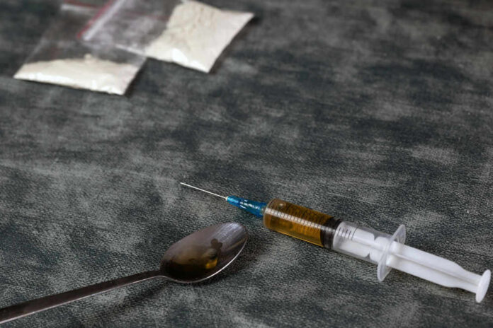 Heroin needle with spoon