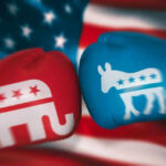 Red and blue boxing gloves with political party symbols