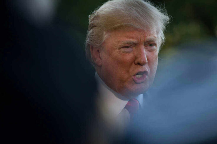 Donald Trump speaking outdoors