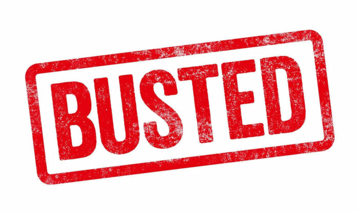Red Busted stamp on white background