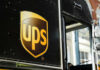 Black delivery truck with UPS logo visible