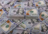 Stack of one hundred dollar bills, Benjamin Franklins portrait