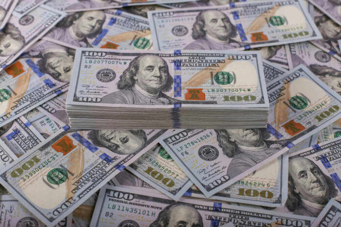 Stack of one hundred dollar bills, Benjamin Franklins portrait