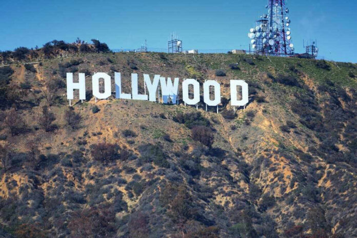 shutterstock_2420199795.jpg Hollywood sign on hillside with communication towers
