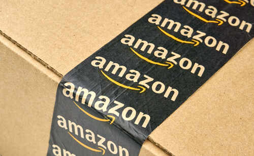 shutterstock_416136610.jpg Close-up of an Amazon-branded shipping box tape on a cardboard box