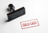 Rubber stamp with the words COLD CASE next to a stamped impression