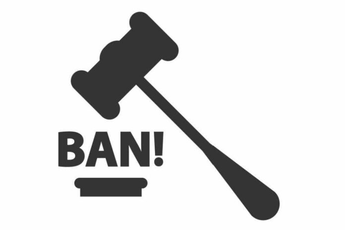 Gavel hitting block with BAN text.