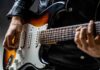 Close-up of a musician playing an electric guitar
