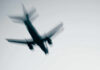 Airplane in flight with motion blur.