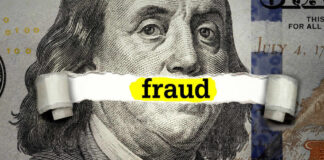 Dollar bill with fraud text overlay