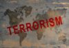 World map with the word TERRORISM crossed out in red