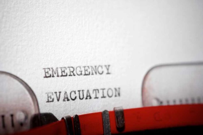 Close-up of a typewritten emergency evacuation notice