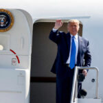 Donald Trump stepping out of Air Force One