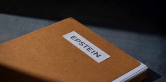 A brown folder with a label reading 'EPSTEIN'