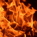 Valero Refinery ERUPTS In Flames Close-up of vibrant flames with an orange glow