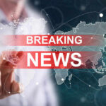 NOW: USPS Fuel Surcharge Will SLAM Small Businesses Breaking news graphic over world map background.