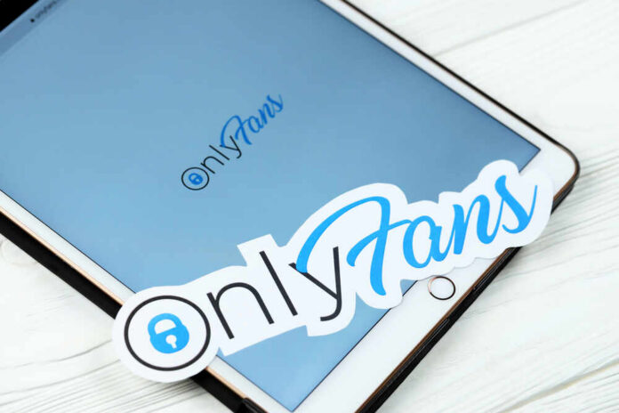 OnlyFans logo displayed on a mobile device with a sticker