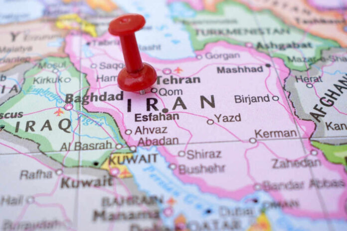 Red pushpin on map of Iran