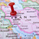 Red pushpin on map of Iran