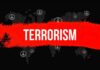 Graphic representation of terrorism with peace symbols and a bold red stripe