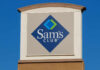 Sign for Sam's Club against a clear blue sky