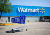 Shopping cart in a Walmart parking lot.