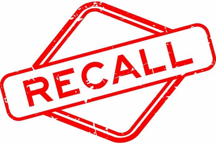 Red stamp with the word 'RECALL' inside a diamond shape