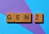 Wooden letter blocks spelling 'GENZ' on a colorful background