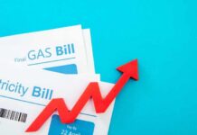 Electricity and gas bills with a red upward arrow