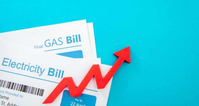 Electricity and gas bills with a red upward arrow