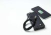 A portable charger and smartphone with a charging cable