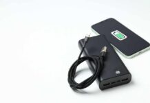 A portable charger and smartphone with a charging cable