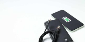 A portable charger and smartphone with a charging cable