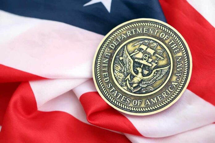 Navy medal resting on an American flag