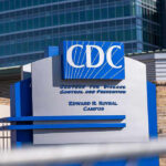 ‘Not COVID’: CDC Chief Warns Reporters CDC building sign in front of structure.
