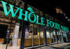 Exterior view of a Whole Foods Market store at night
