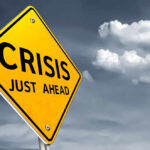 Gas CRISIS Triggers Trump Annuncement A yellow warning sign indicating a crisis ahead