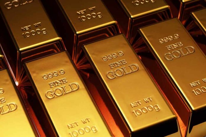 Gold,In,Bullion.,Gold,For,Trading.,Gold,And,Banking,Concepts. Close-up of gold bars stacked together