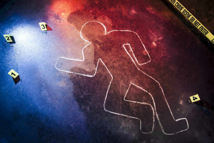 Crime scene chalk outline with numbered evidence markers.